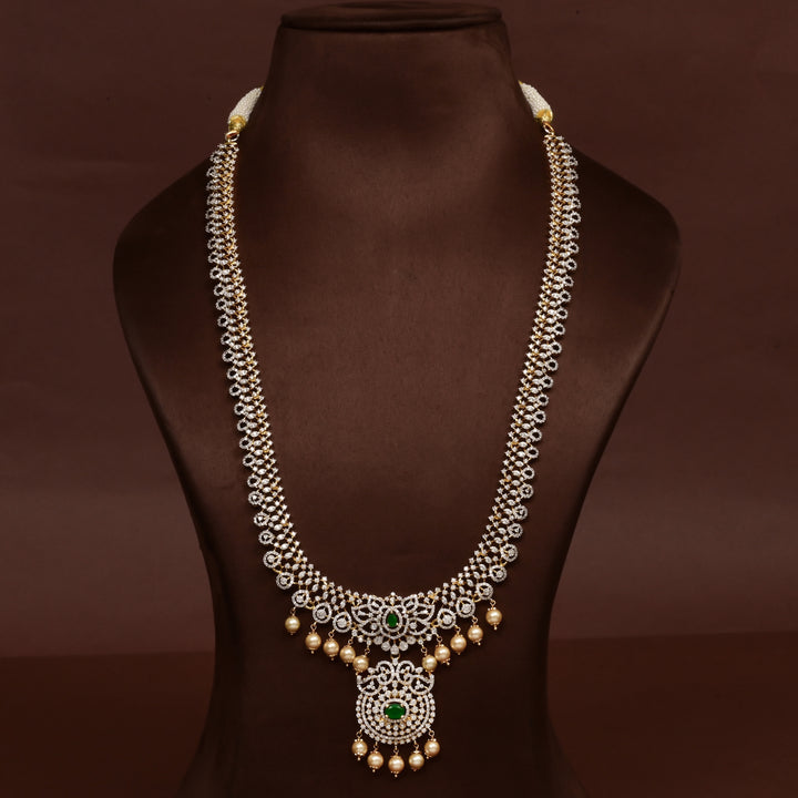 Hriday collection of 92.5 silver necklace with CZ stones, intricate floral motifs, and pendant design for bridal and festive wear by Sri Fine Jewellery, Hyderabad.