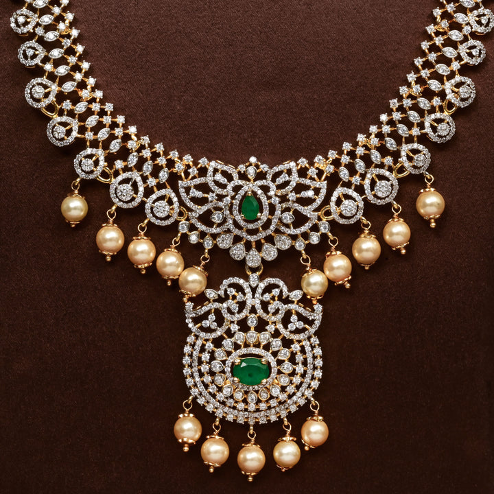 Close-up of Hriday collection of 92.5 silver necklace with CZ stones, intricate floral motifs, and pendant design for bridal and festive wear by Sri Fine Jewellery, Hyderabad.