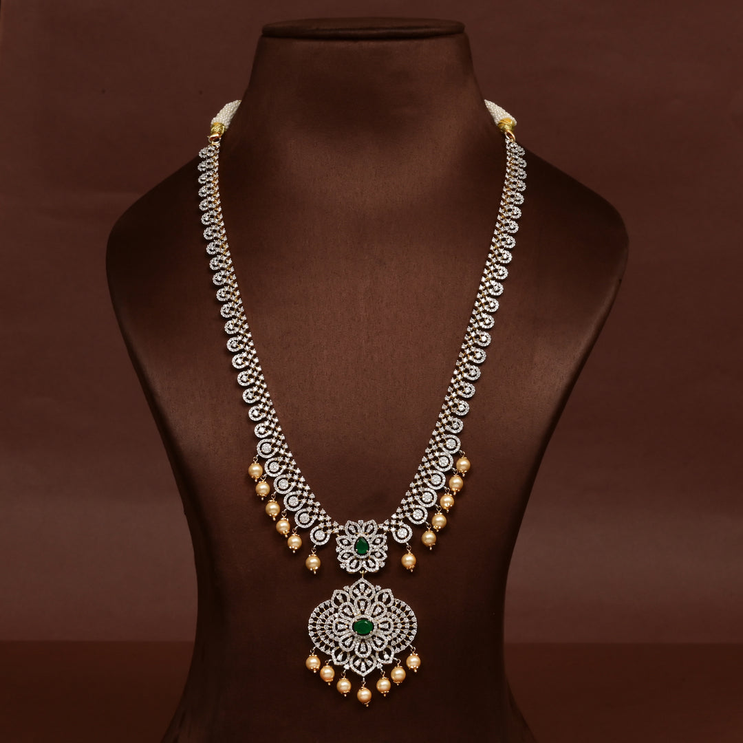 Hriday collection of 92.5 silver necklace with CZ stones, intricate floral motifs, and pendant design for bridal and festive wear by Sri Fine Jewellery, Hyderabad.