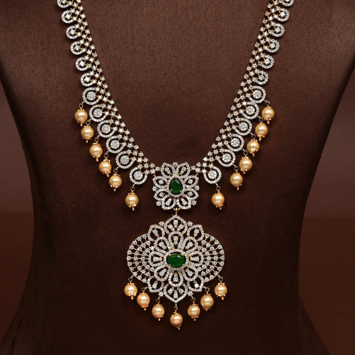 Close-up of Hriday collection of 92.5 silver necklace with CZ stones, intricate floral motifs, and pendant design for bridal and festive wear by Sri Fine Jewellery, Hyderabad.