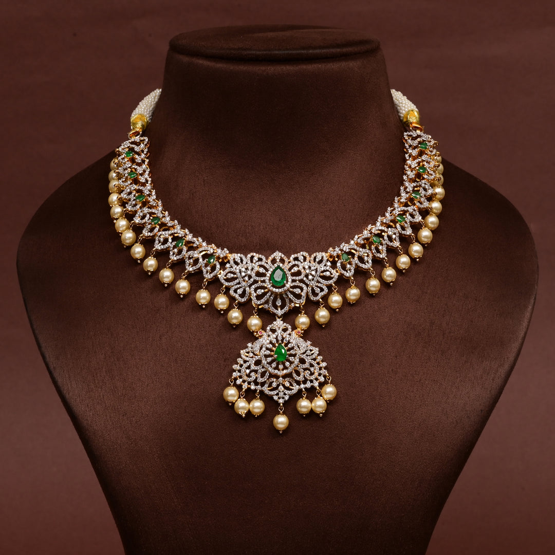 Hriday collection of 92.5 silver necklace with CZ stones, intricate floral motifs, and pendant design for bridal and festive wear by Sri Fine Jewellery, Hyderabad.