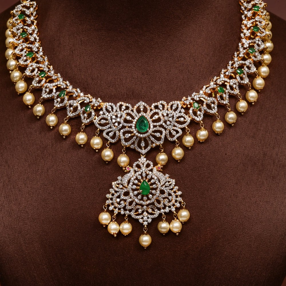 Close-up of Hriday collection of 92.5 silver necklace with CZ stones, intricate floral motifs, and pendant design for bridal and festive wear by Sri Fine Jewellery, Hyderabad.