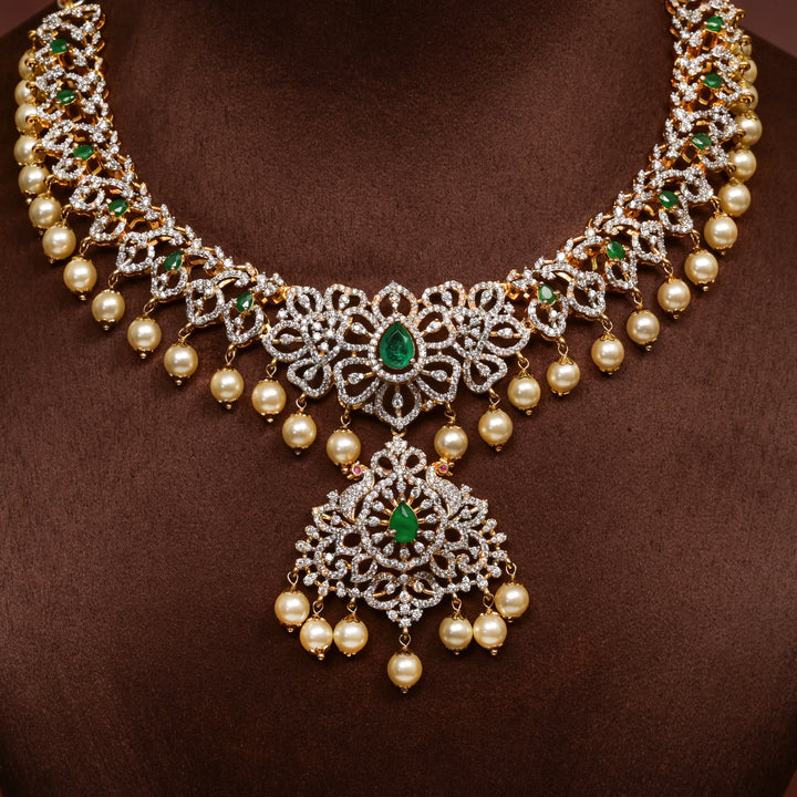 Close-up of Hriday collection of 92.5 silver necklace with CZ stones, intricate floral motifs, and pendant design for bridal and festive wear by Sri Fine Jewellery, Hyderabad.