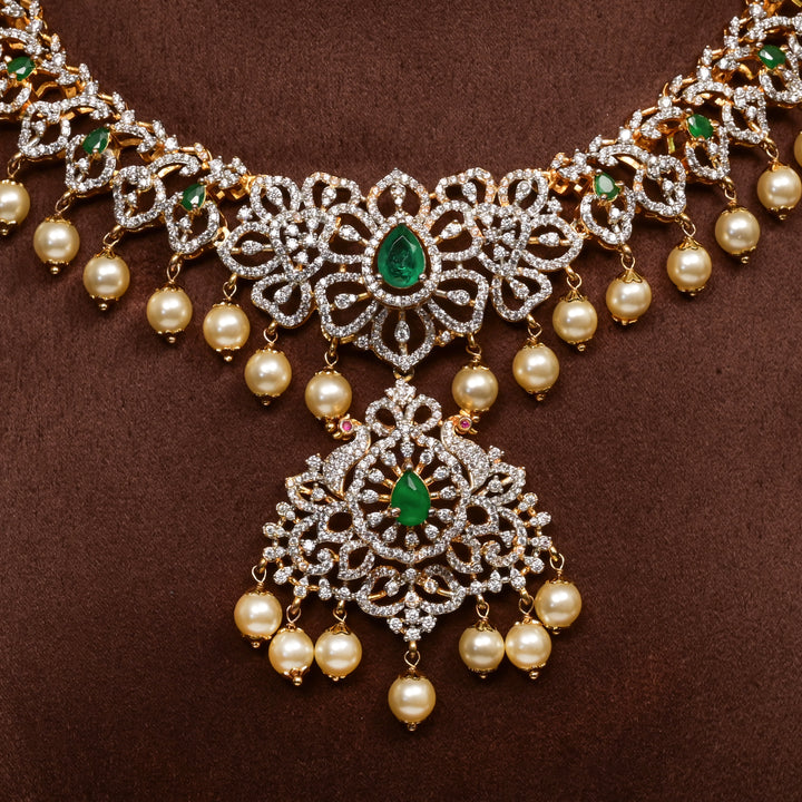 Close-up of Hriday collection of 92.5 silver necklace with CZ stones, intricate floral motifs, and pendant design for bridal and festive wear by Sri Fine Jewellery, Hyderabad.