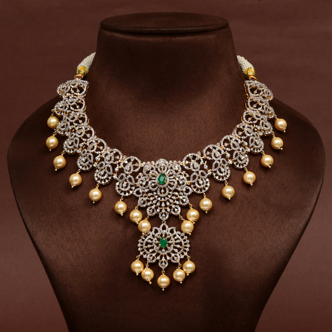 Hriday collection of 92.5 silver necklace with CZ stones, intricate floral motifs, and pendant design for bridal and festive wear by Sri Fine Jewellery, Hyderabad.