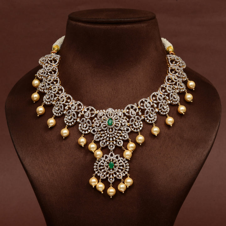 Hriday collection of 92.5 silver necklace with CZ stones, intricate floral motifs, and pendant design for bridal and festive wear by Sri Fine Jewellery, Hyderabad.
