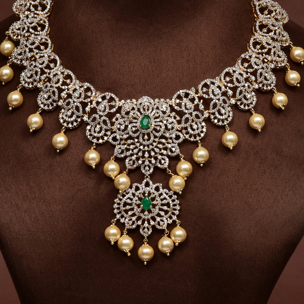 Close-up of Hriday collection of 92.5 silver necklace with CZ stones, intricate floral motifs, and pendant design for bridal and festive wear by Sri Fine Jewellery, Hyderabad.