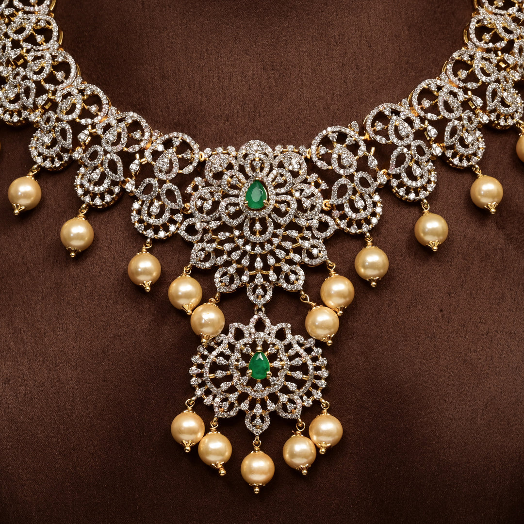 Close-up of Hriday collection of 92.5 silver necklace with CZ stones, intricate floral motifs, and pendant design for bridal and festive wear by Sri Fine Jewellery, Hyderabad.