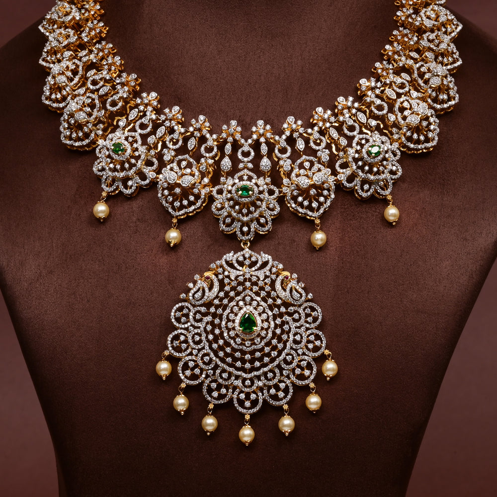 Close-up of Hriday collection of  92.5 silver Victorian-style long necklace with CZ stones, intricate floral motifs, and pendant design for bridal and festive wear by Sri Fine Jewellery, Hyderabad.
