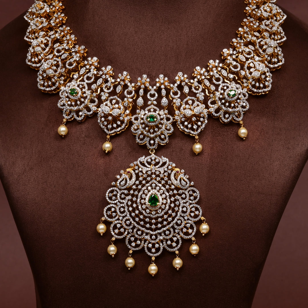 Close-up of Hriday collection of  92.5 silver Victorian-style long necklace with CZ stones, intricate floral motifs, and pendant design for bridal and festive wear by Sri Fine Jewellery, Hyderabad.
