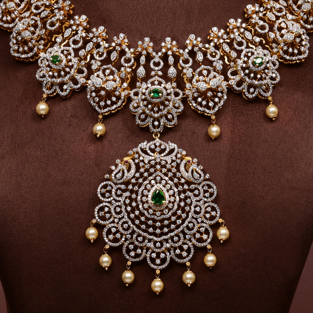 Close-up of Hriday collection of  92.5 silver Victorian-style long necklace with CZ stones, intricate floral motifs, and pendant design for bridal and festive wear by Sri Fine Jewellery, Hyderabad.