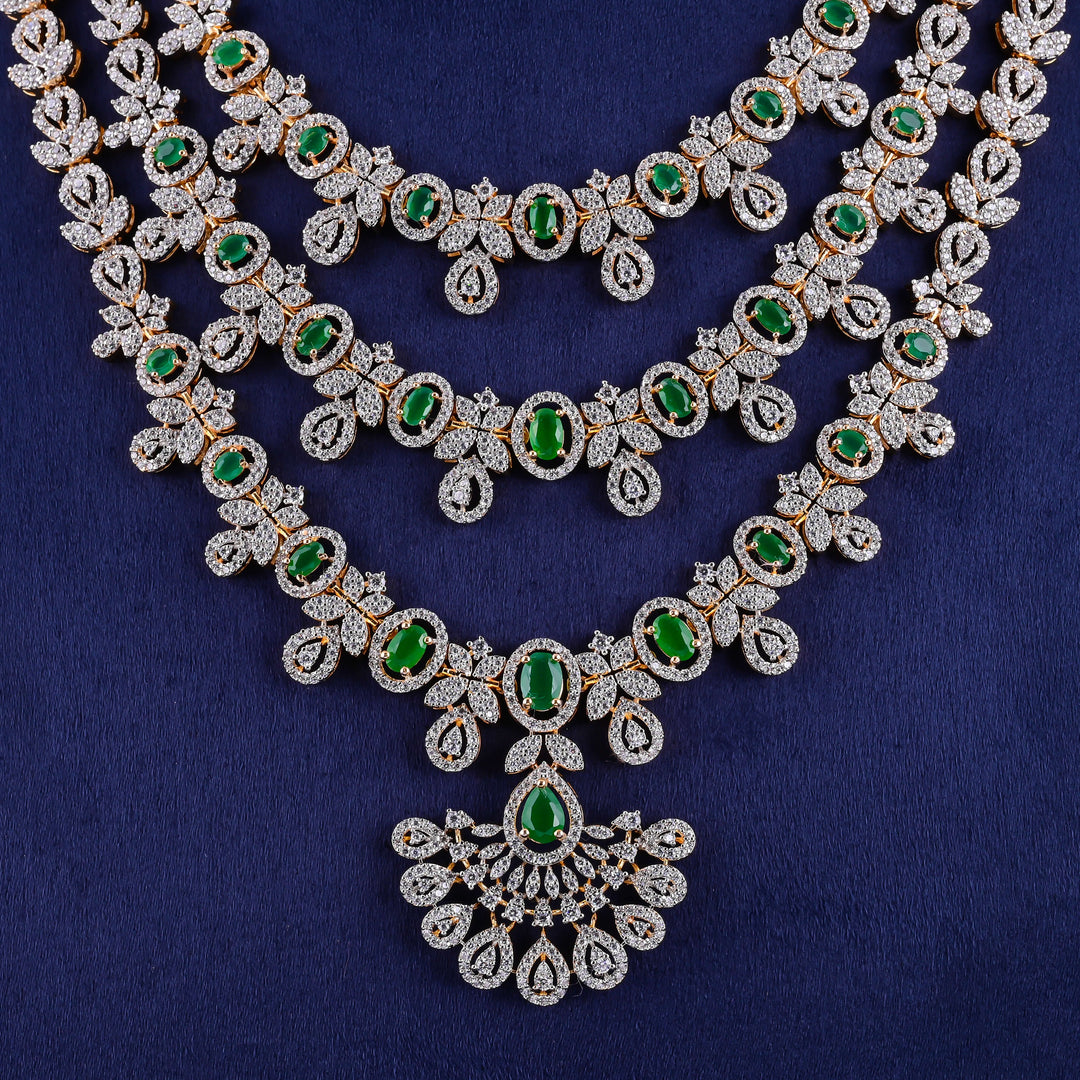 Hriday luxury layered cz emerald necklace in 92.5 silver with emerald green stones, cz diamonds and premium bridal craftsmanship by Sri Fine Jewellery, Hyderabad