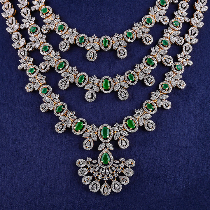 Hriday luxury layered cz emerald necklace in 92.5 silver with emerald green stones, cz diamonds and premium bridal craftsmanship by Sri Fine Jewellery, Hyderabad