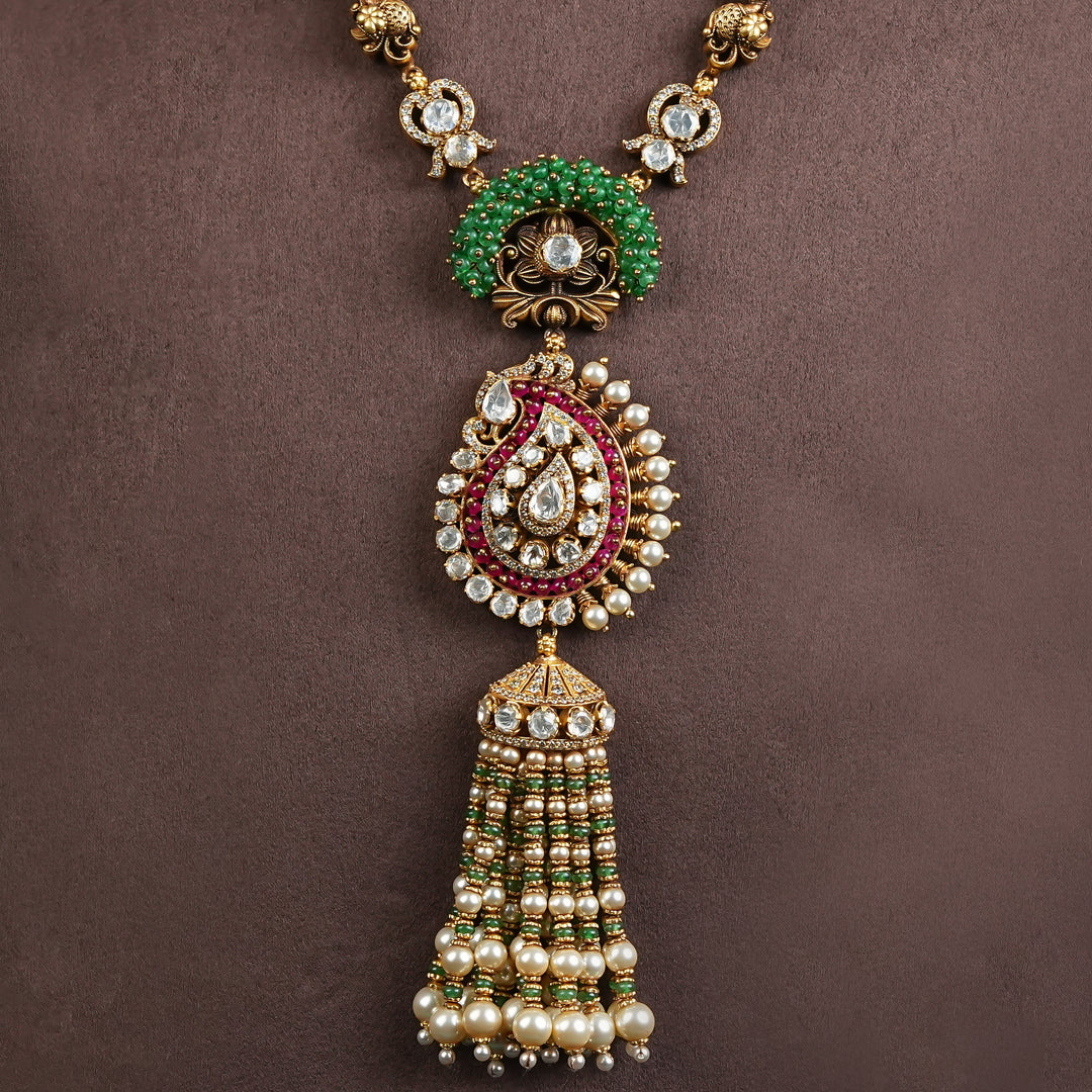 Samairaa antique pendant necklace in 92.5 silver with green bead detailing, cz stones, ruby accents and pearl tassel craftsmanship by Sri Fine Jewellery, Hyderabad