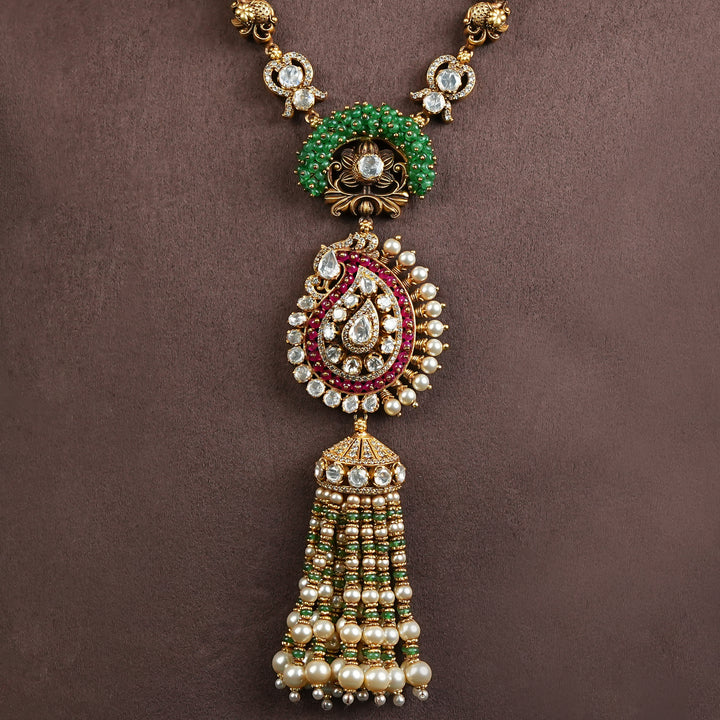 Samairaa antique pendant necklace in 92.5 silver with green bead detailing, cz stones, ruby accents and pearl tassel craftsmanship by Sri Fine Jewellery, Hyderabad