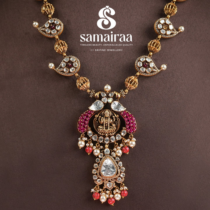Samairaa antique Lakshmi pendant necklace in 92.5 silver with cz stones, ruby accents, pearl drops and traditional temple craftsmanship by Sri Fine Jewellery, Hyderabad