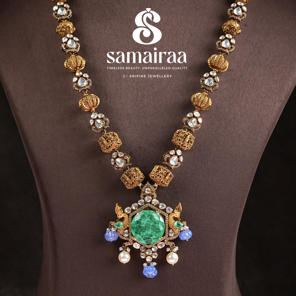 Samairaa long heritage necklace in 92.5 silver with cz stones, antique gold finish, emerald green pendant and pearl drops by Sri Fine Jewellery, Hyderabad 