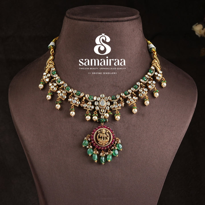 Samairaa traditional temple necklace in 92.5 silver with cz stones, emerald green beads, pearl drops and antique gold finish pendant by Sri Fine Jewellery, Hyderabad