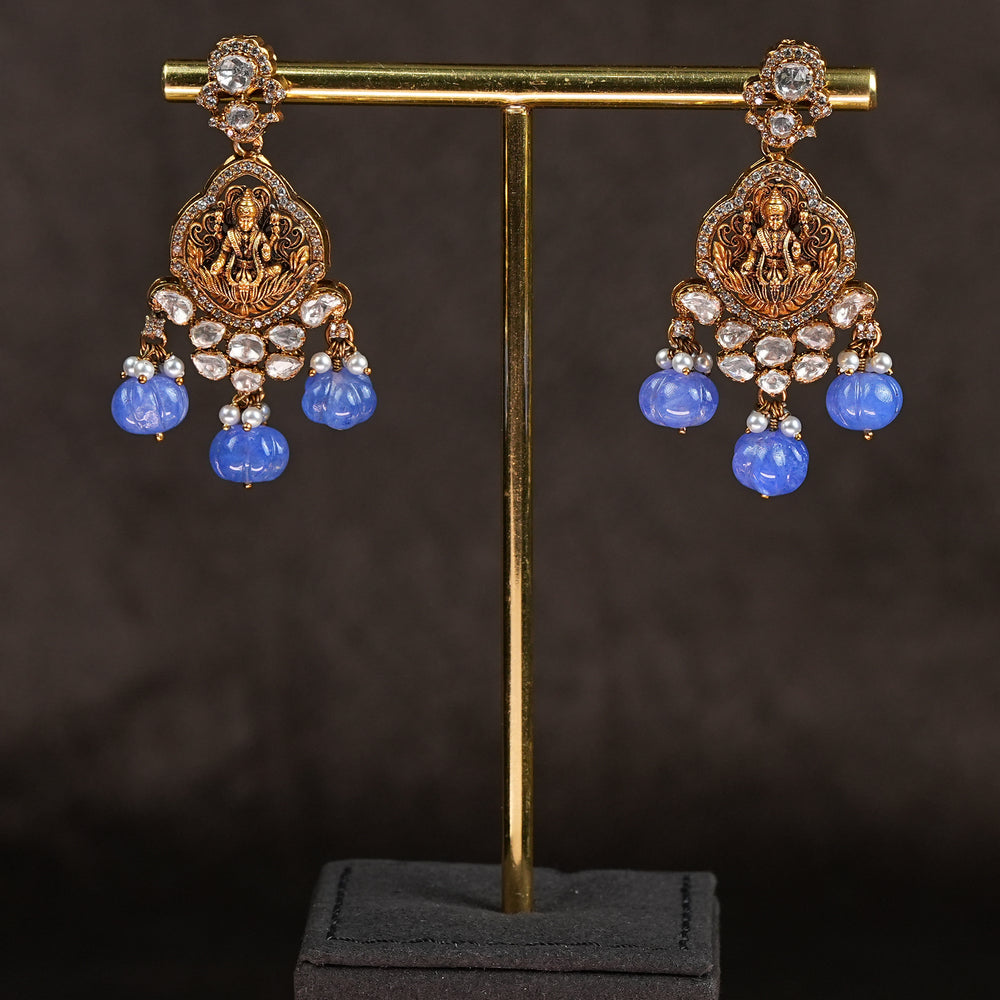 Samairaa temple long earrings in 92.5 silver with Lakshmi pendant, antique gold finish, cz stones and traditional South Indian bridal jewellery design by Sri Fine Jewellery, Hyderabad