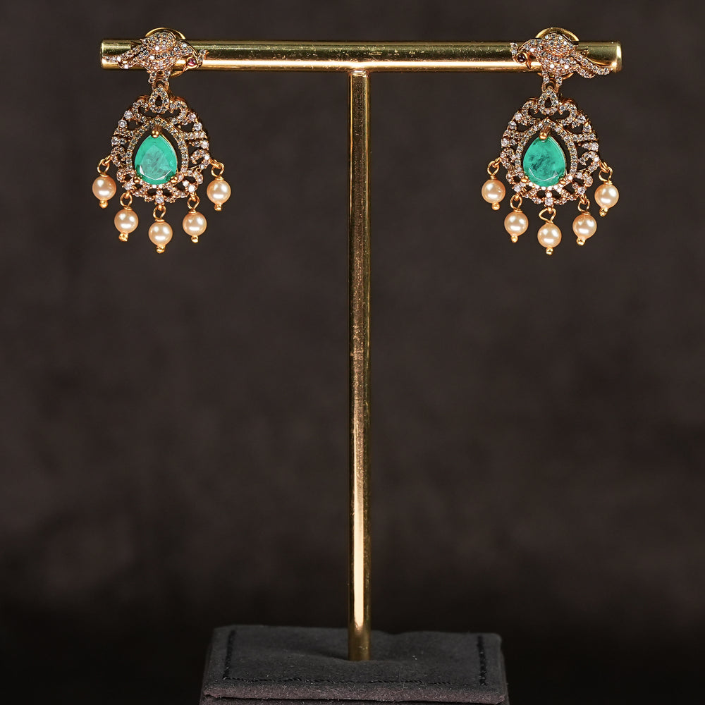 Samairaa emerald green victorian earrings in 92.5 silver with antique gold finish, cz stones, pearl drops and elegant bridal jewellery design by Sri Fine Jewellery, Hyderabad