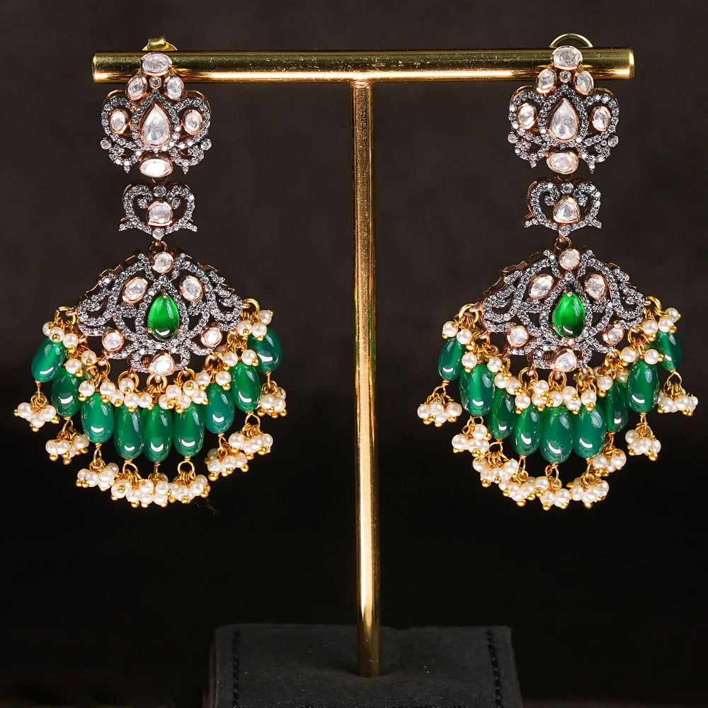Samairaa emerald green victorian earrings in 92.5 silver with diamond-like stones, antique finish and luxurious bridal heritage jewellery design by Sri Fine Jewellery, Hyderabad. 
