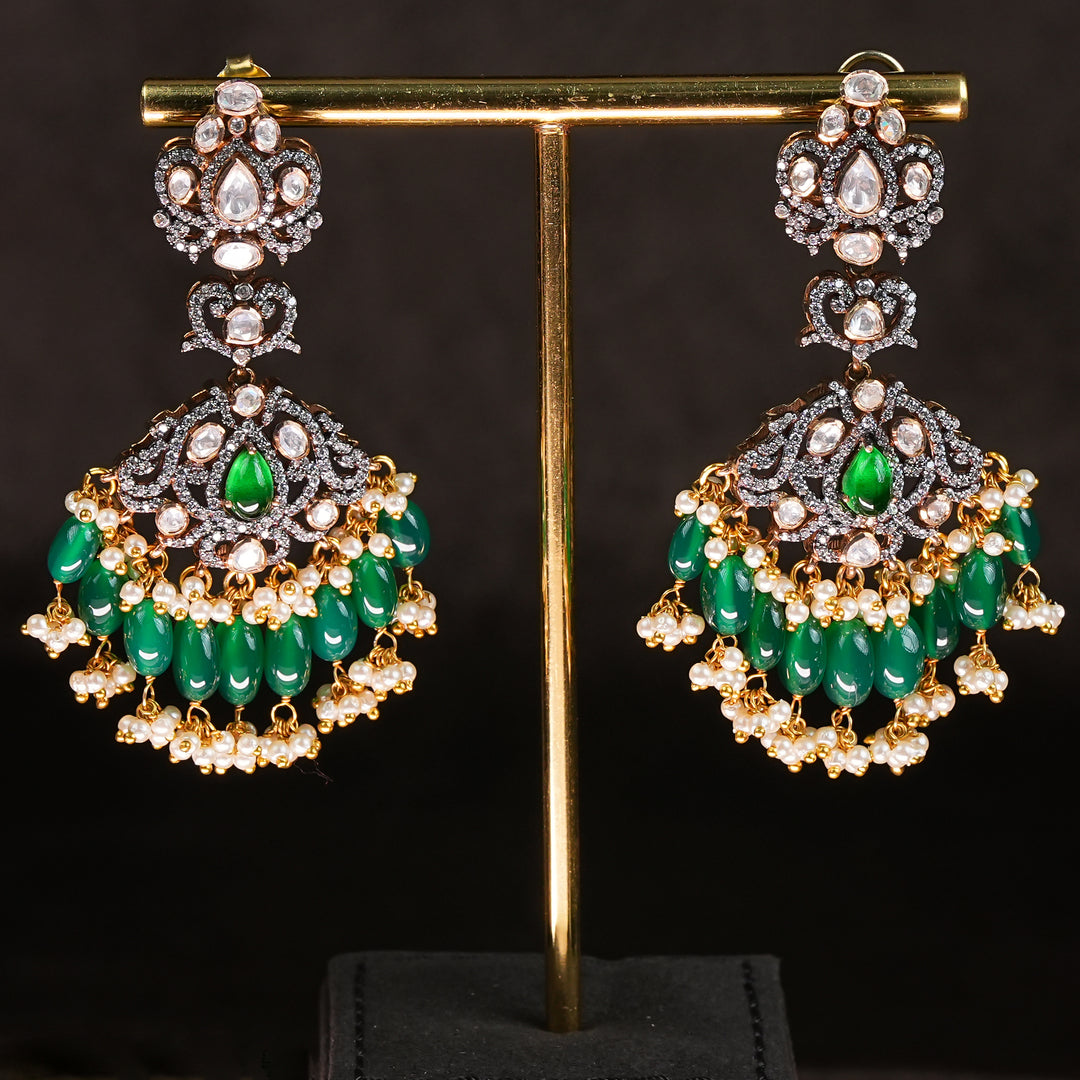 Samairaa emerald green victorian earrings in 92.5 silver with diamond-like stones, antique finish and luxurious bridal heritage jewellery design by Sri Fine Jewellery, Hyderabad. 
