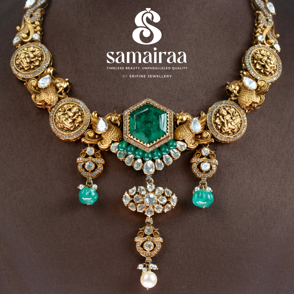Samairaa antique coin necklace in 92.5 silver with emerald green center stone, Lakshmi coin motifs, pearl drops and cz detailing | premium temple bridal jewellery by Sri Fine Jewellery, Hyderabad