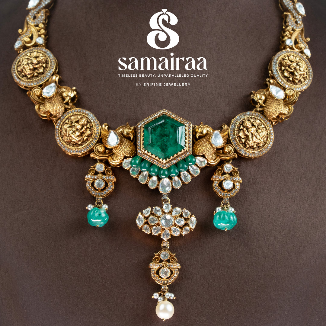 Samairaa antique coin necklace in 92.5 silver with emerald green center stone, Lakshmi coin motifs, pearl drops and cz detailing | premium temple bridal jewellery by Sri Fine Jewellery, Hyderabad