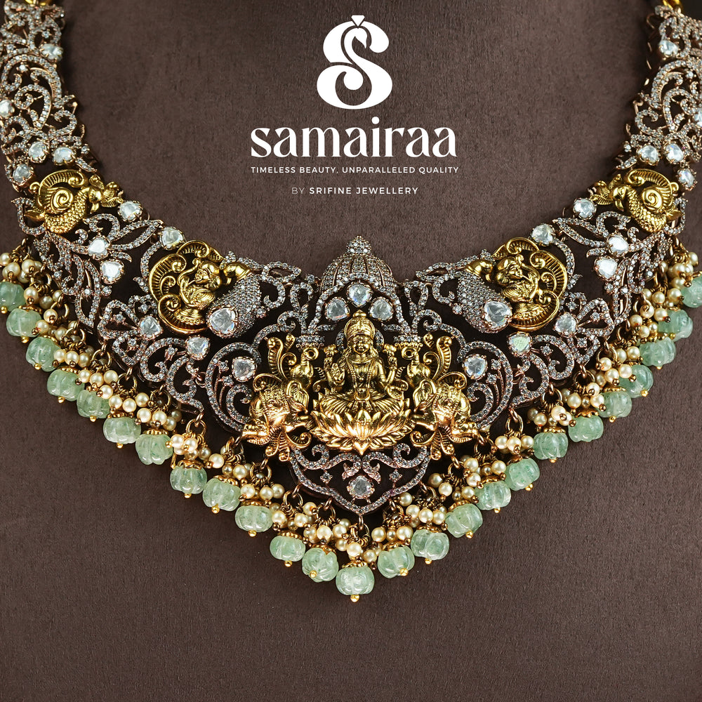 Samairaa antique temple necklace in 92.5 silver with Lakshmi motif, victorian detailing, green bead drops and cz stones | premium traditional bridal jewellery by Sri Fine Jewellery, Hyderabad 
