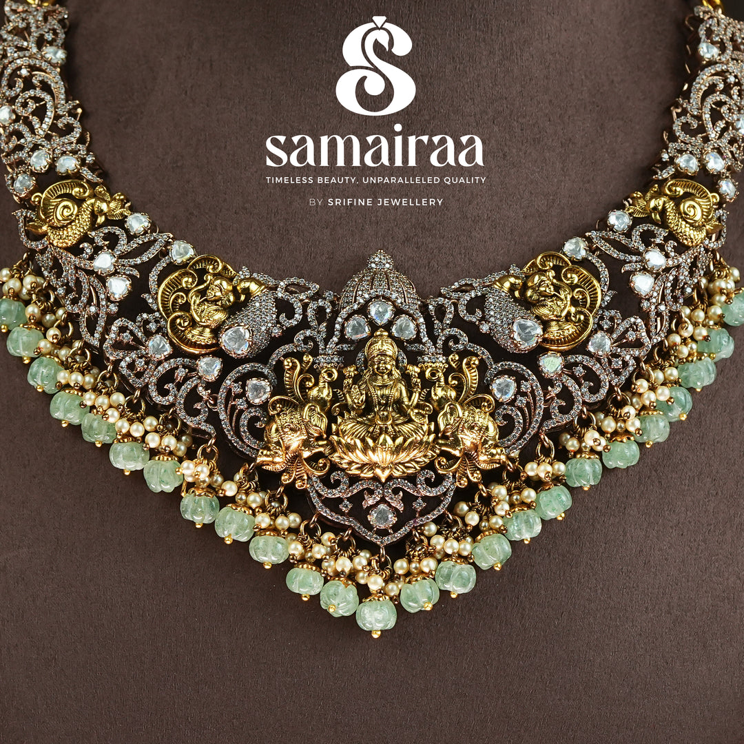 Samairaa antique temple necklace in 92.5 silver with Lakshmi motif, victorian detailing, green bead drops and cz stones | premium traditional bridal jewellery by Sri Fine Jewellery, Hyderabad 

