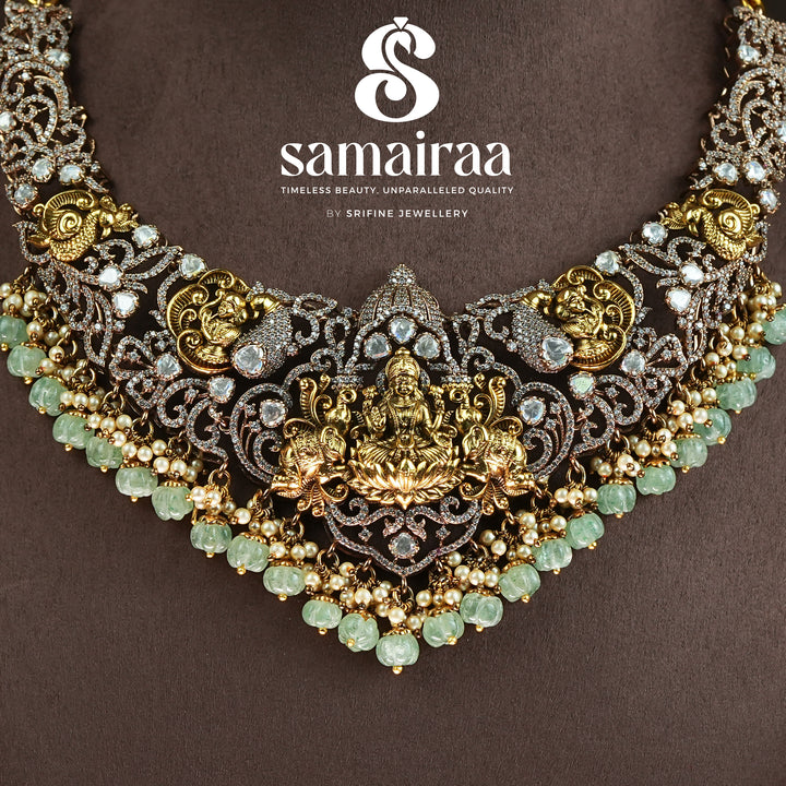 Samairaa antique temple necklace in 92.5 silver with Lakshmi motif, victorian detailing, green bead drops and cz stones | premium traditional bridal jewellery by Sri Fine Jewellery, Hyderabad 
