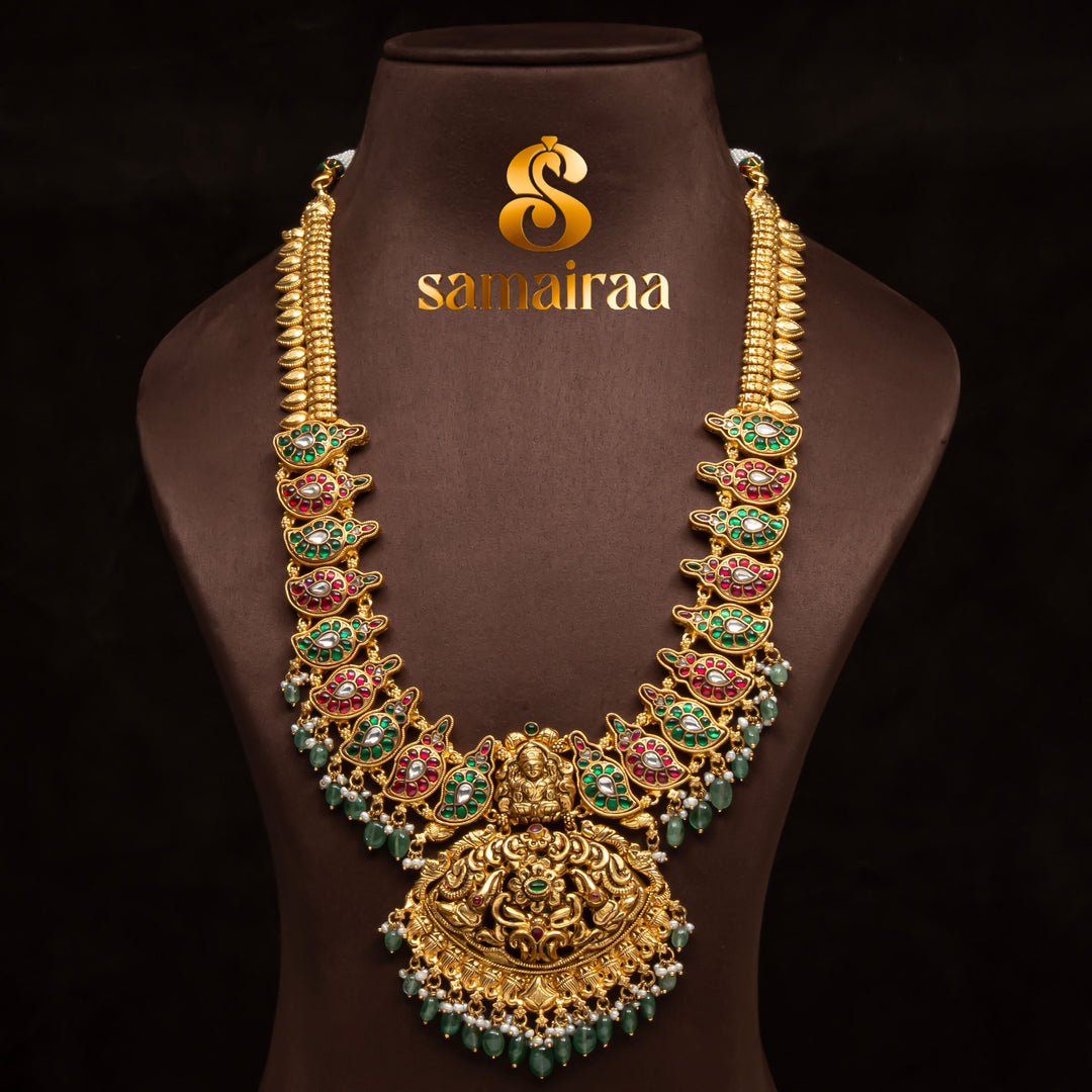 Traditional 92.5 silver temple necklace with Lakshmi pendant, mango motifs, ruby emerald  stone detailing, and intricate heritage craftsmanship by Sri Fine Jewellery Hyderabad (https://srifinejewellery.com)
