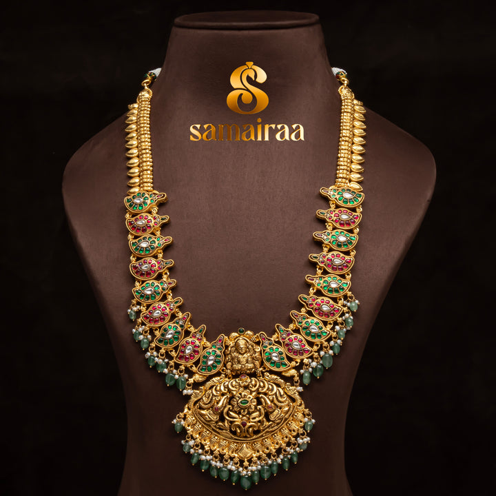 Traditional 92.5 silver temple necklace with Lakshmi pendant, mango motifs, ruby emerald  stone detailing, and intricate heritage craftsmanship by Sri Fine Jewellery Hyderabad (https://srifinejewellery.com)