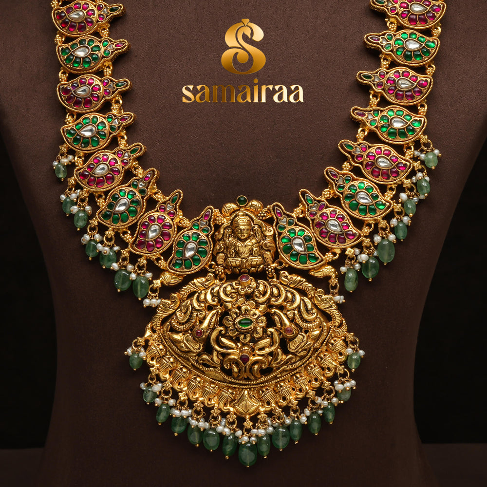 Traditional 92.5 silver temple necklace with Lakshmi pendant, mango motifs, ruby emerald  stone detailing, and intricate heritage craftsmanship by Sri Fine Jewellery Hyderabad (https://srifinejewellery.com)