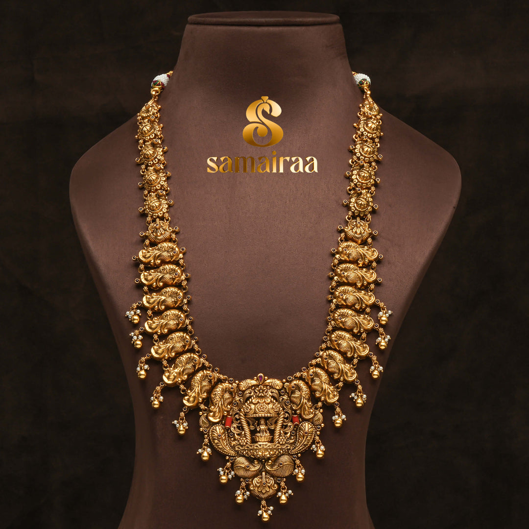 Traditional 92.5 silver temple necklace with peacock motifs, ruby stone detailing, and intricate heritage craftsmanship by Sri Fine Jewellery Hyderabad (https://srifinejewellery.com)
