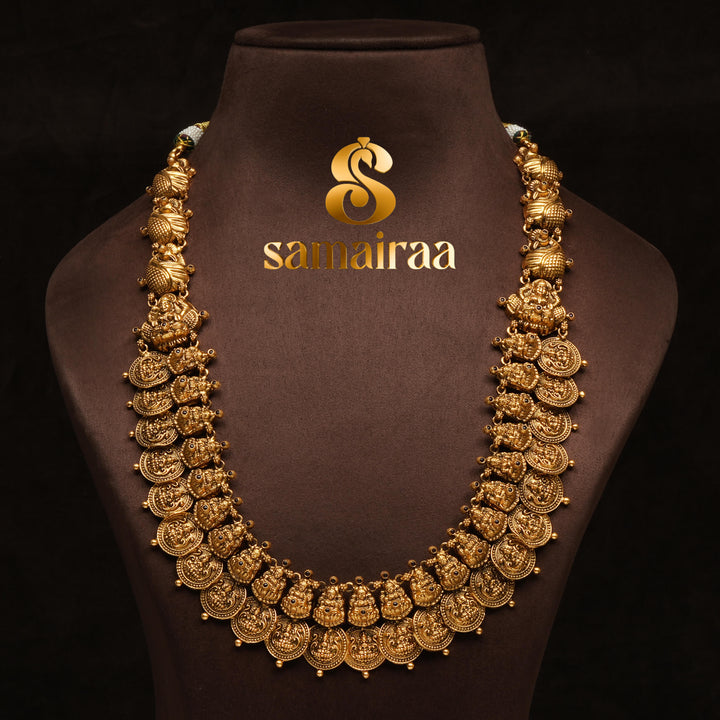Traditional antique temple silver 92.5 necklace with floral kundan motifs, peacock design, green bead drops and traditional South Indian bridal jewellery craftsmanship by Sri Fine Jewellery Hyderabad.

