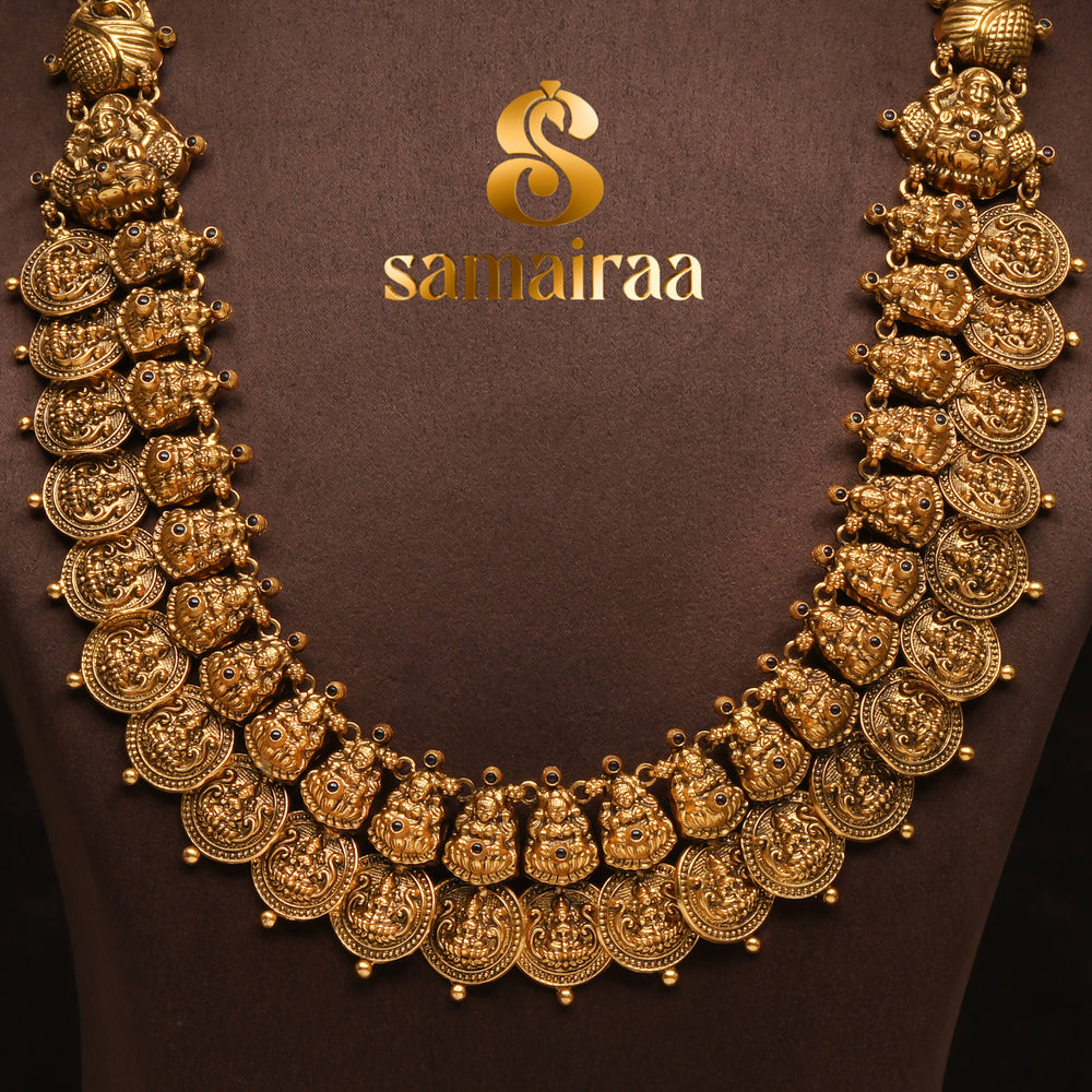 Traditional antique temple silver 92.5 kasumala necklace with Lakshmi motifs, ruby stone detailing and traditional South Indian bridal jewellery craftsmanship by Sri Fine Jewellery Hyderabad.