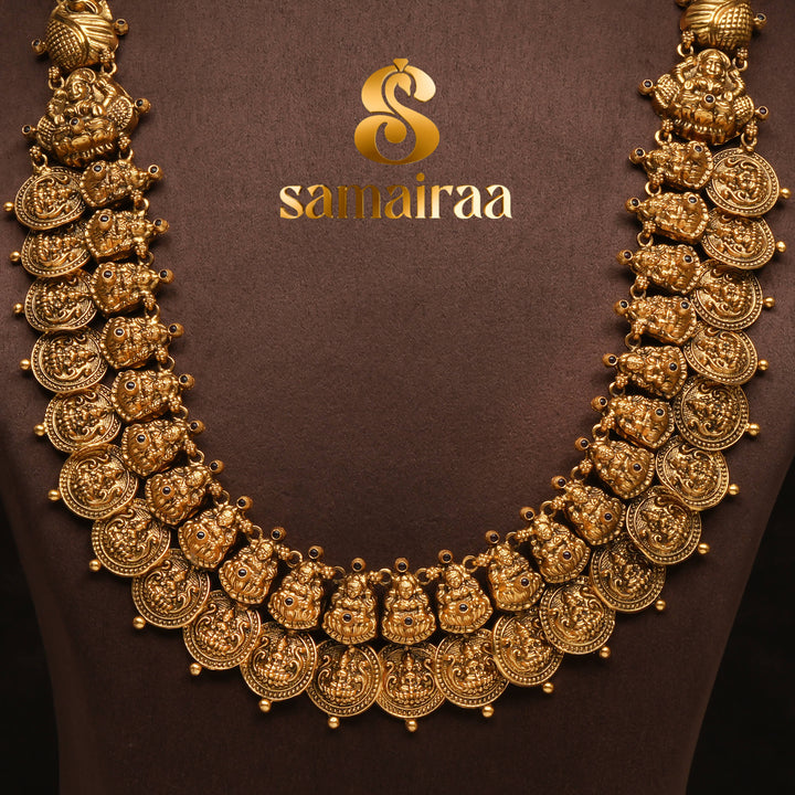 Traditional antique temple silver 92.5 kasumala necklace with Lakshmi motifs, ruby stone detailing and traditional South Indian bridal jewellery craftsmanship by Sri Fine Jewellery Hyderabad.