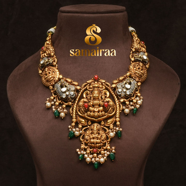 Traditional 92.5 silver temple necklace with Lakshmi pendant, ruby stone detailing, and intricate heritage craftsmanship by Sri Fine Jewellery Hyderabad (https://srifinejewellery.com)