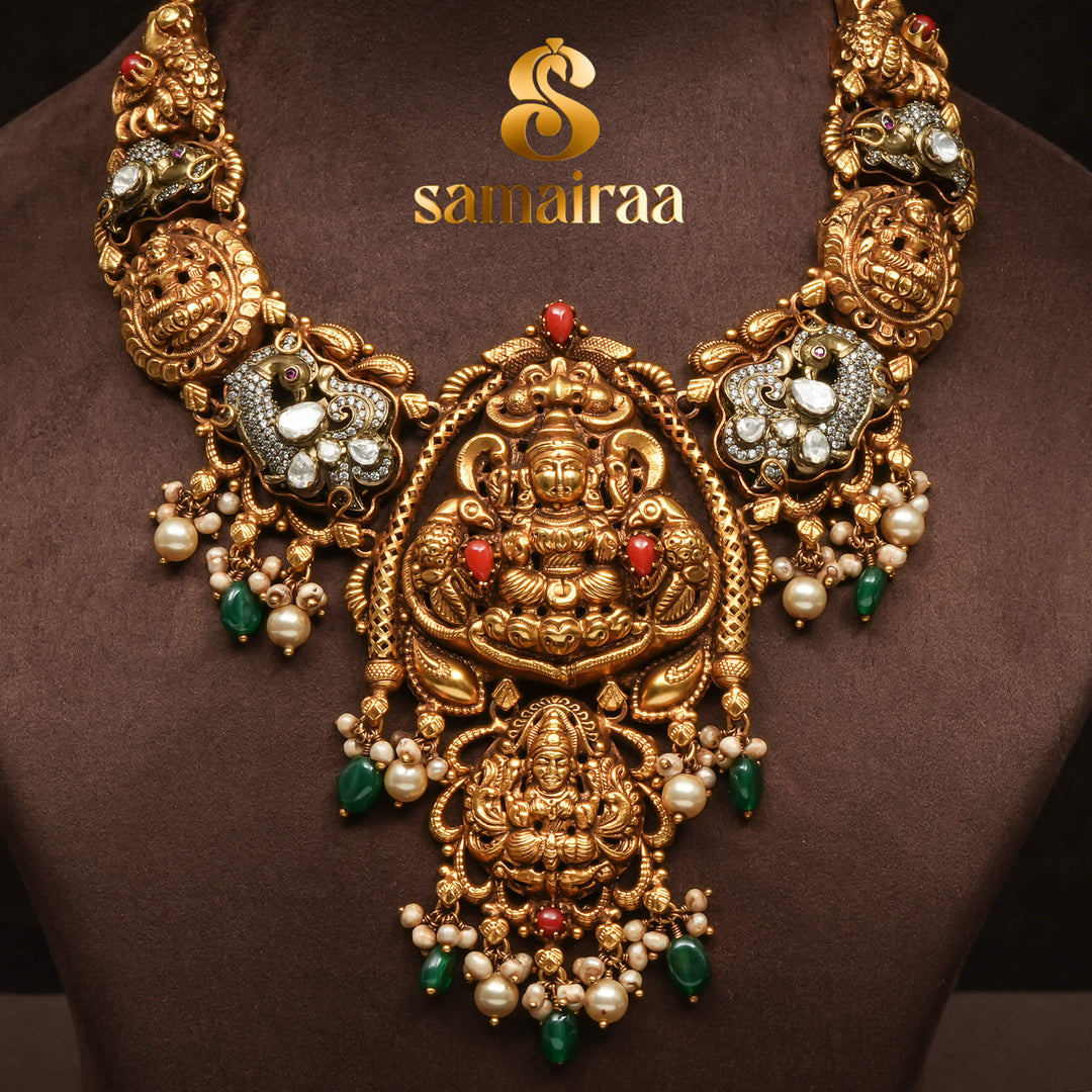 Traditional 92.5 silver temple necklace with Lakshmi pendant, ruby stone detailing, peacock motifs and intricate heritage craftsmanship by Sri Fine Jewellery Hyderabad (https://srifinejewellery.com)