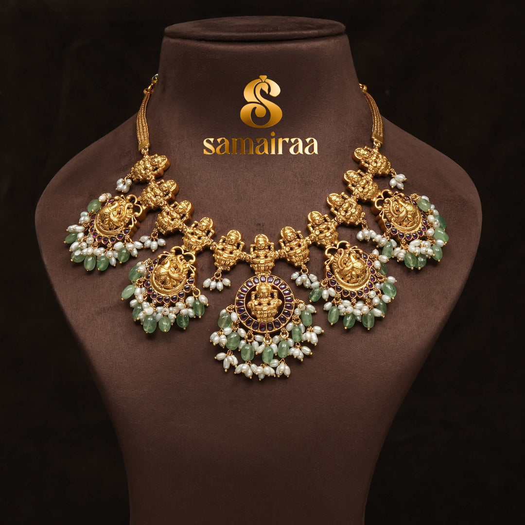 Traditional 92.5 silver temple necklace with Lakshmi motifs, rice pearls, and intricate heritage craftsmanship by Sri Fine Jewellery Hyderabad (https://srifinejewellery.com)