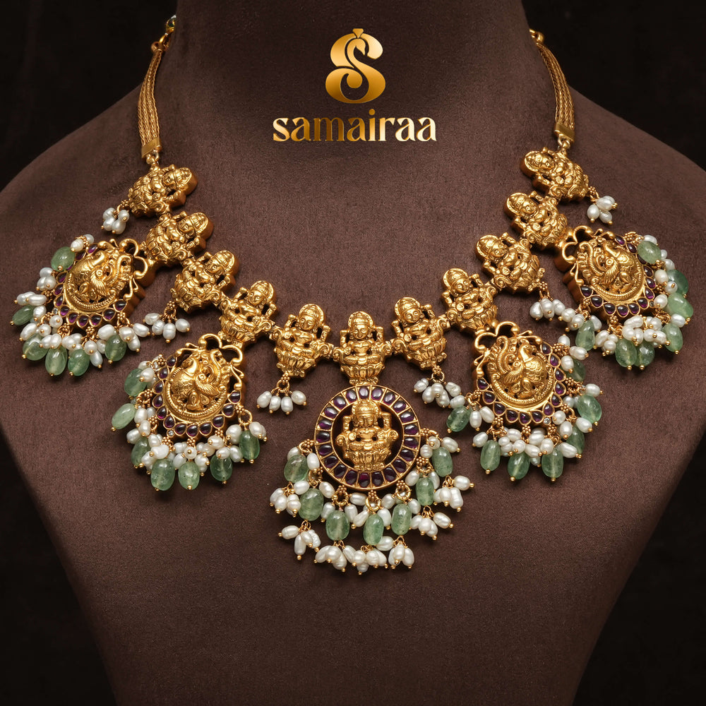Traditional 92.5 silver temple necklace with Lakshmi motifs, rice pearls, and intricate heritage craftsmanship by Sri Fine Jewellery Hyderabad (https://srifinejewellery.com)