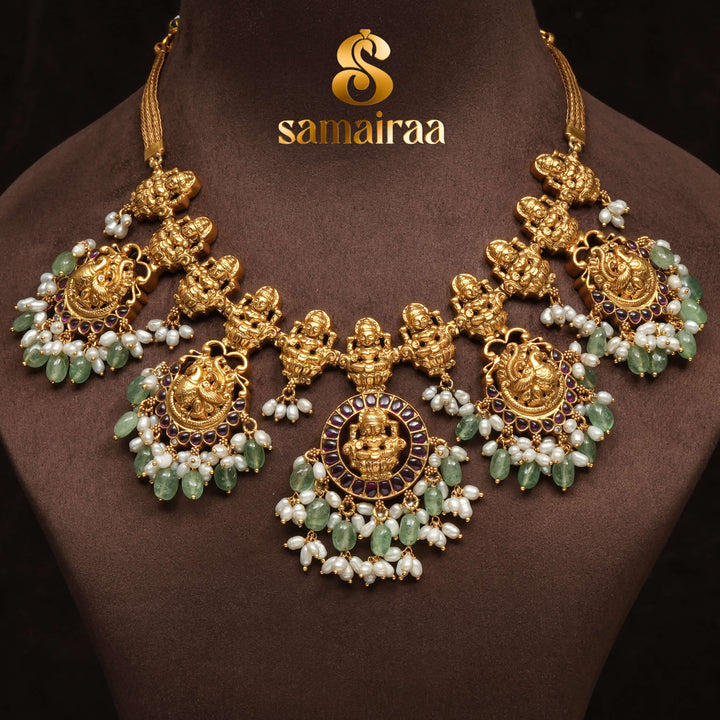 Traditional 92.5 silver temple necklace with Lakshmi motifs, rice pearls, and intricate heritage craftsmanship by Sri Fine Jewellery Hyderabad (https://srifinejewellery.com)