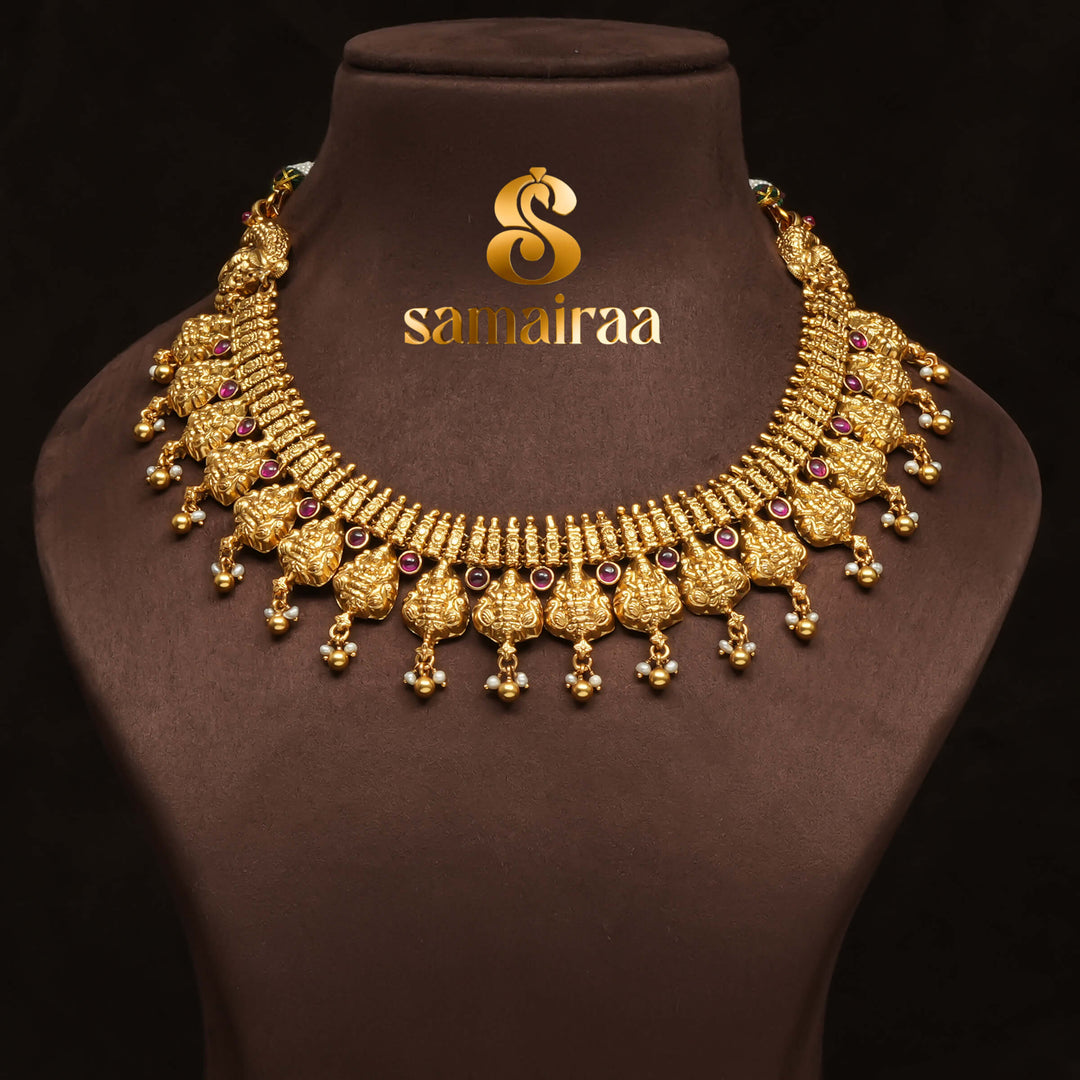 Traditional 92.5 silver temple necklace with Lakshmi motifs, ruby stone detailing, and intricate heritage craftsmanship by Sri Fine Jewellery Hyderabad (https://srifinejewellery.com)