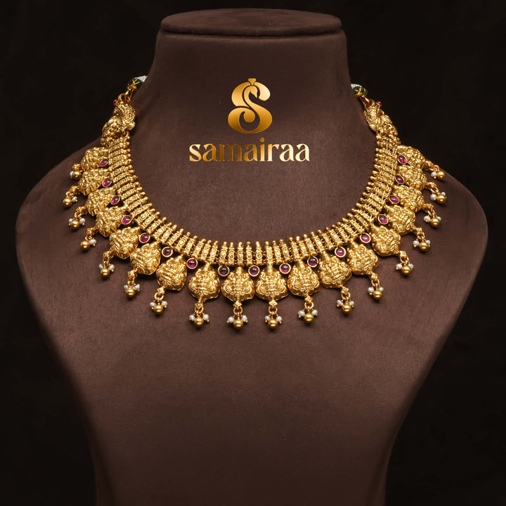 Traditional 92.5 silver temple necklace with Lakshmi motifs, ruby stone detailing, and intricate heritage craftsmanship by Sri Fine Jewellery Hyderabad (https://srifinejewellery.com)