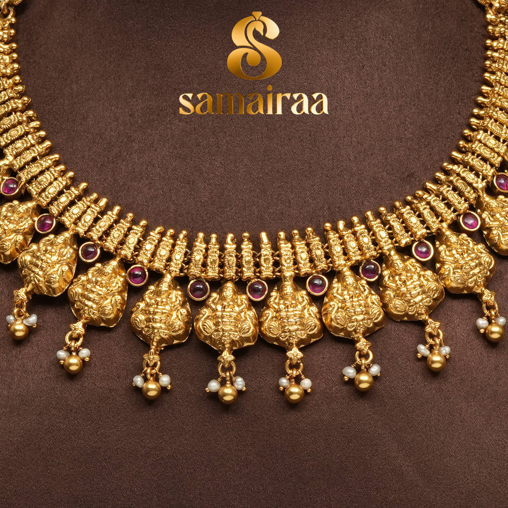 Traditional 92.5 silver temple necklace with Lakshmi motifs, ruby stone detailing, and intricate heritage craftsmanship by Sri Fine Jewellery Hyderabad (https://srifinejewellery.com)