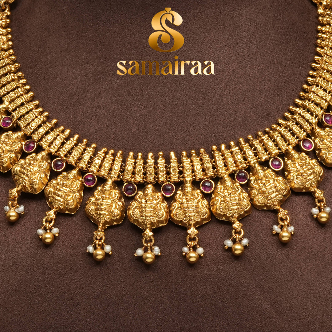 Traditional 92.5 silver temple necklace with Lakshmi motifs, ruby stone detailing, and intricate heritage craftsmanship by Sri Fine Jewellery Hyderabad (https://srifinejewellery.com)