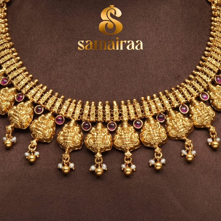 Traditional 92.5 silver temple necklace with Lakshmi motifs, ruby stone detailing, and intricate heritage craftsmanship by Sri Fine Jewellery Hyderabad (https://srifinejewellery.com)