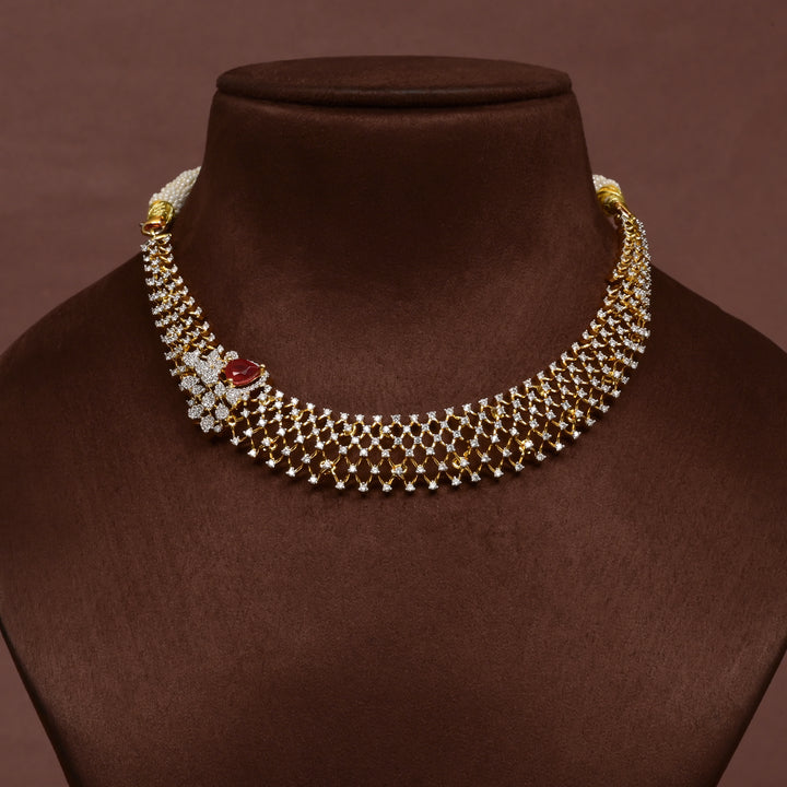 Luxury diamond-look silver cz ruby necklace with premium cz stones and semi-precious ruby stone in 92.5 silver, bridal wedding jewellery with gold finish by Sri Fine Jewellery Punjagutta Hyderabad.