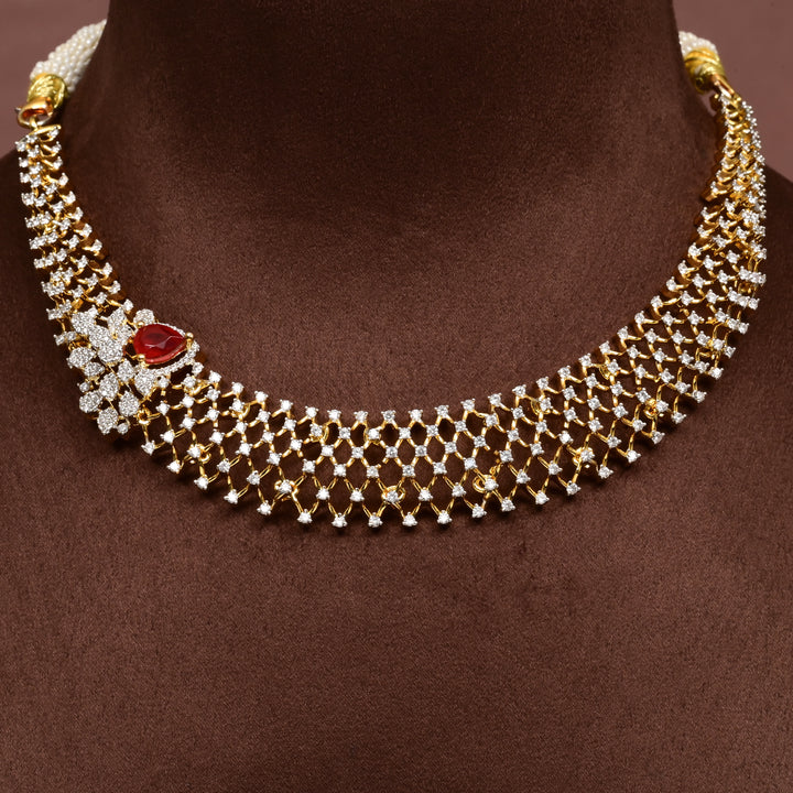 Luxury diamond-look silver cz ruby necklace with premium cz stones and semi-precious ruby stone in 92.5 silver, bridal wedding jewellery with gold finish by Sri Fine Jewellery Punjagutta Hyderabad.